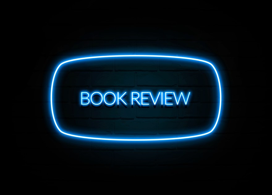 Book Review  - colorful Neon Sign on brickwall