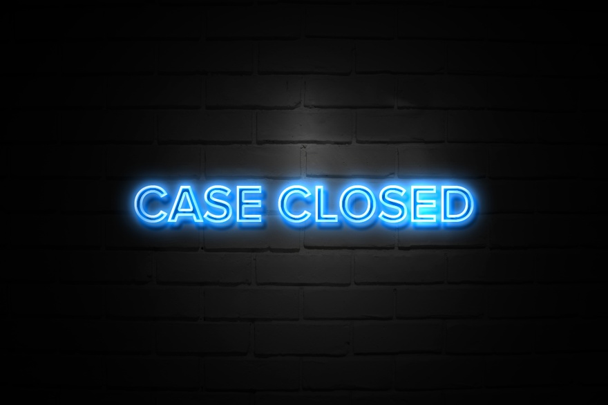 Case Closed neon Sign on brickwall