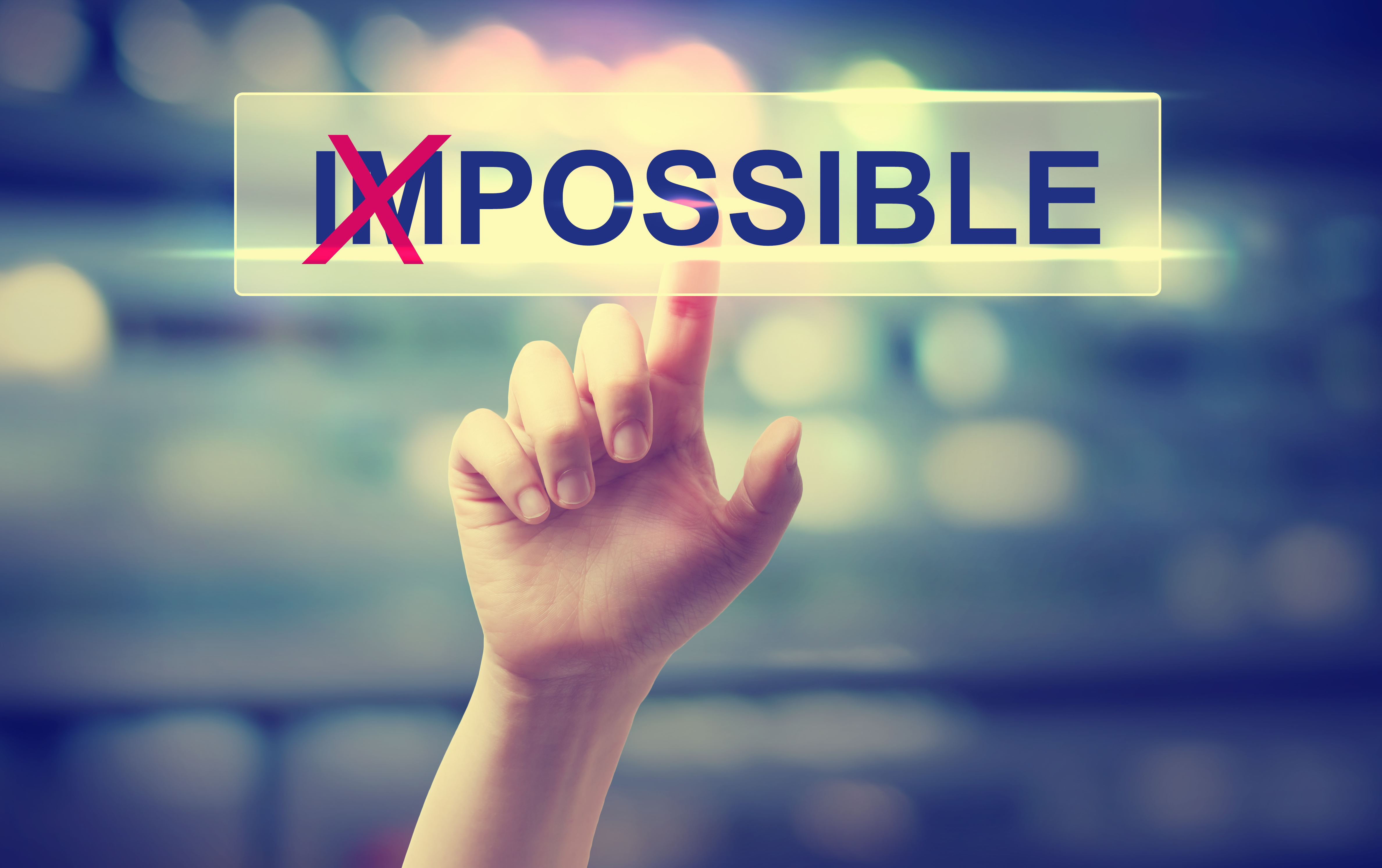 Impossible concept with hand pressing a button