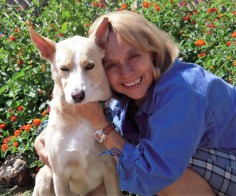 LC Hayden and dog hugging image